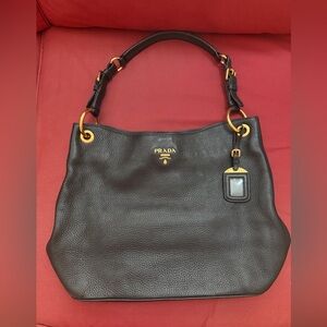 Prada Black Leather Hobo Bag with Gold Accents